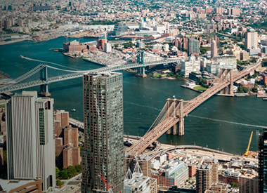 New York City skyline with two large bridges in the foreground